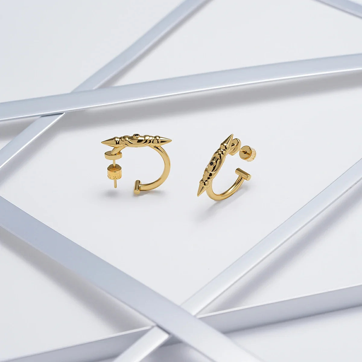 LAMINAR AXIS SPIKE EARRINGS